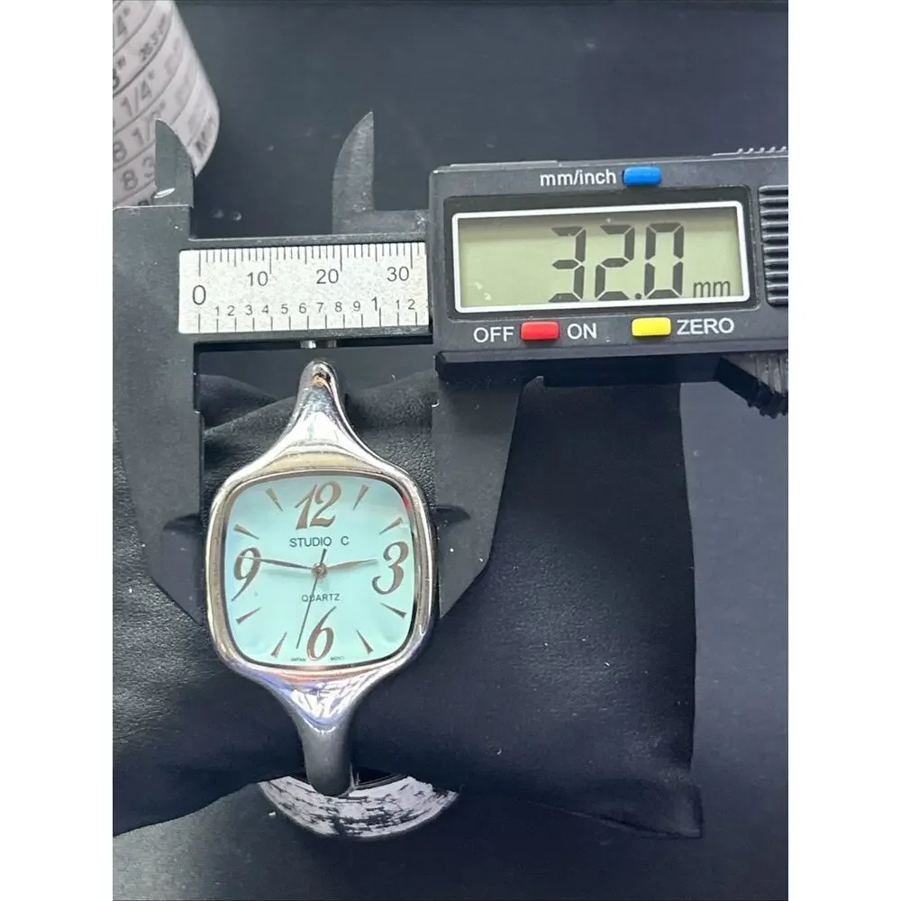 Studio C Baby Blue Dial Women’s Bangle Watch
